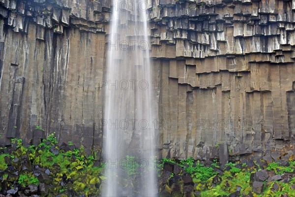 Columnar basalt with waterfall