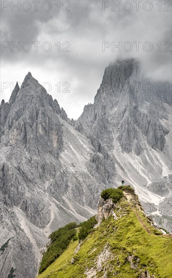 Hiker standing on a ridge