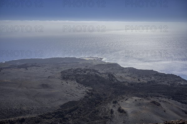View from the volcano Teneguia to the salt flats by the sea