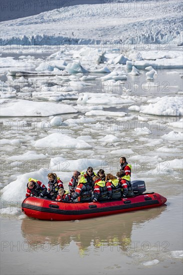 Excursion boat on the ice lagoon Fjallsarlon