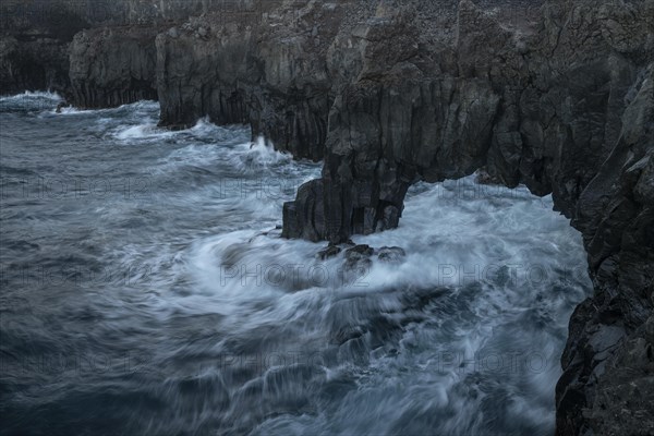 Rock arch juts into the Atlantic