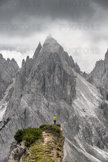 Hiker standing on a ridge