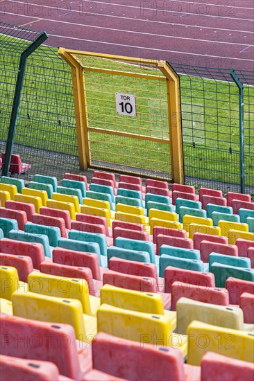 Colourful seats for the spectators at Friedrich Ludwig Jahn Sportpark