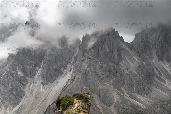 Hiker standing on a ridge