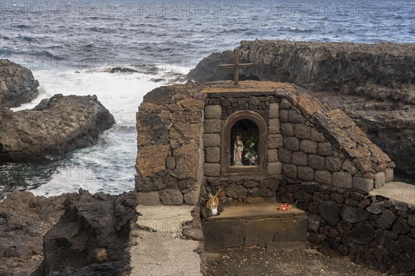 Wayside shrine on the coast near Charco Manso