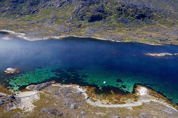 Crystal clear bays in a fjord