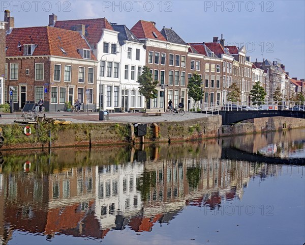 Houses reflected in the canal