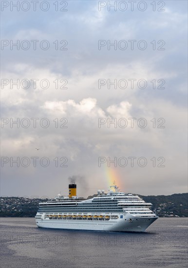 Cruise ship Costa Magica with rainbow in the harbour of Bergen