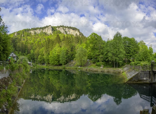 Pond at the Myra Falls with reflection of the rock faces