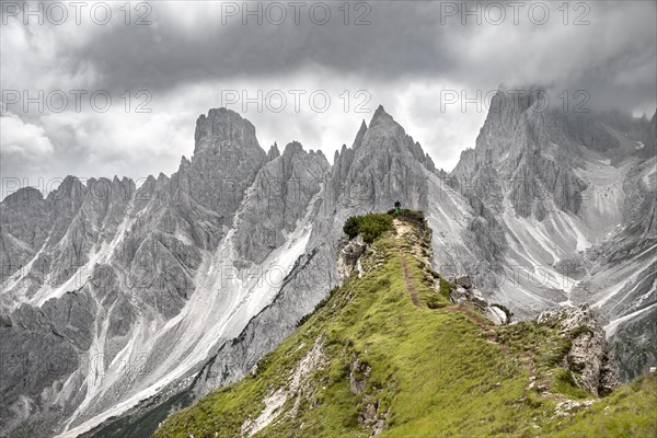 Hiker standing on a ridge