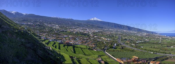 View over the town to the snow-capped Teide