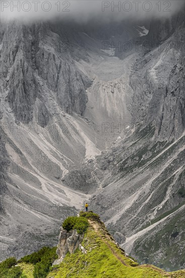 Hiker standing on a ridge