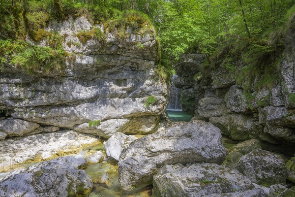 Cascata Rio Repepeit a small artificial waterfall with stone bridge