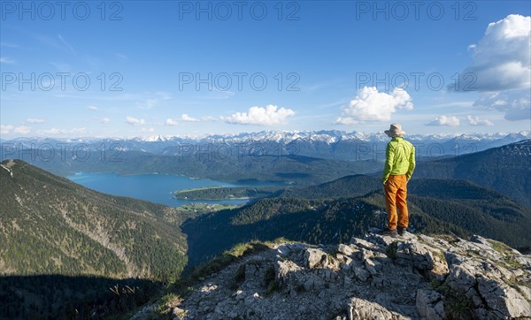 Hiker at the summit of Heimgarten