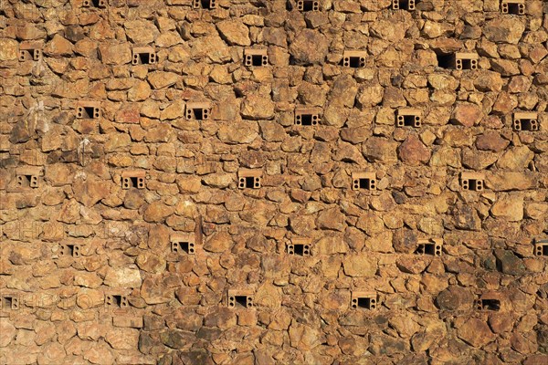 Ventilation holes of the pit wall of a mine