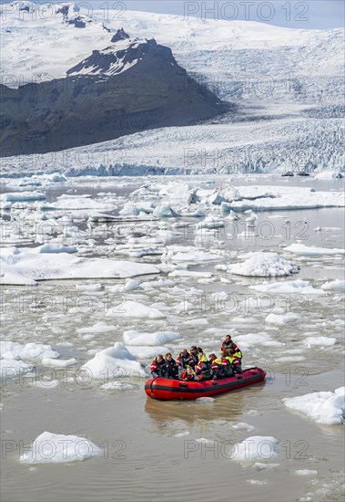 Excursion boat on the ice lagoon Fjallsarlon