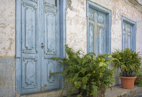 Blue wooden doors at an old house in La Calera