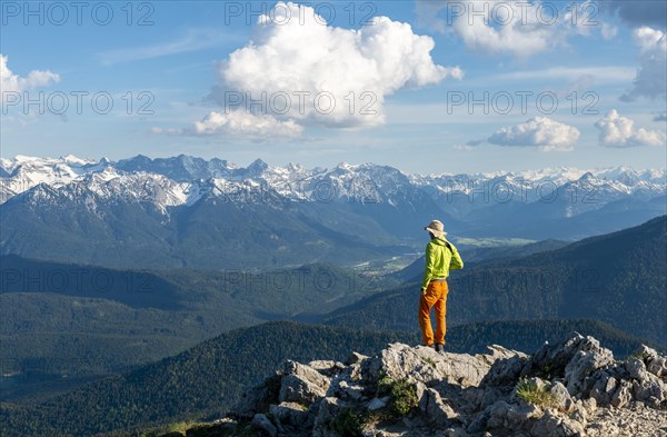 Hiker at the summit of Heimgarten