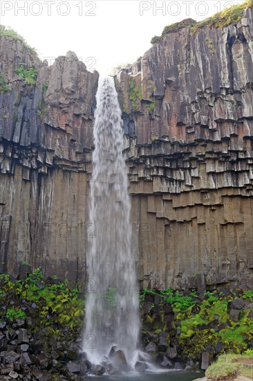 Columnar basalt with waterfall