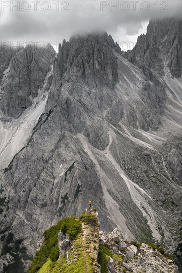 Hiker standing on a ridge