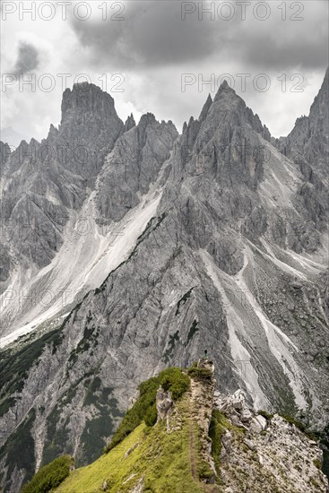 Hiker standing on a ridge