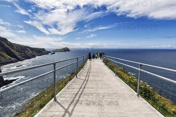 Hiking trail with railing on cliff