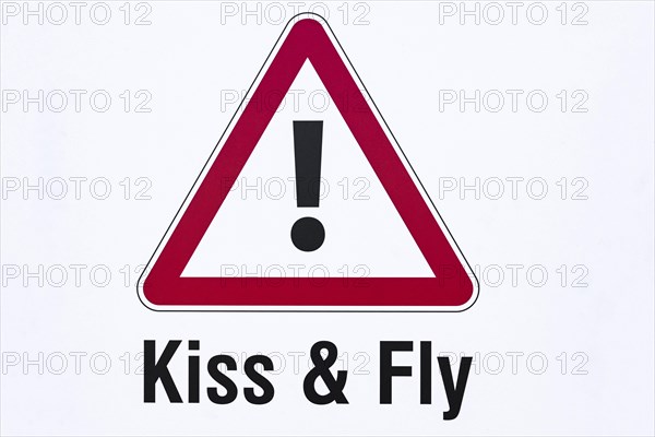 Kiss & Fly warning sign