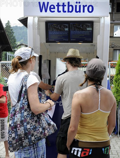 Queuing at the betting shop