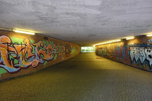 Pedestrian subway painted with graffiti