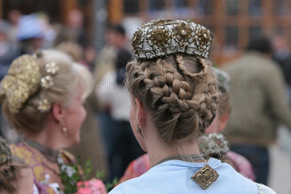 Woman from behind in traditional costume