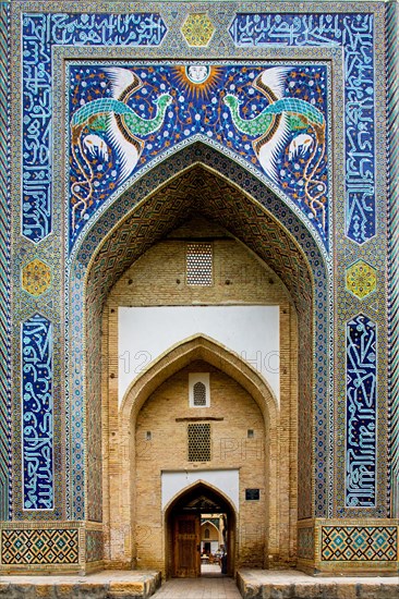 Nadir Devon Begi-Medrese with fabulous birds at the entrance portal