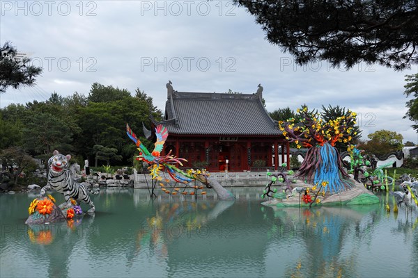 Illuminated figures at the Chinese Garden