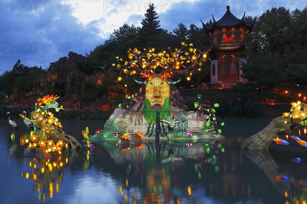 Illuminated figures at the Chinese Garden