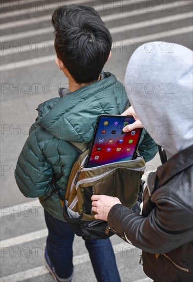 Theft of a tablet from a backpack