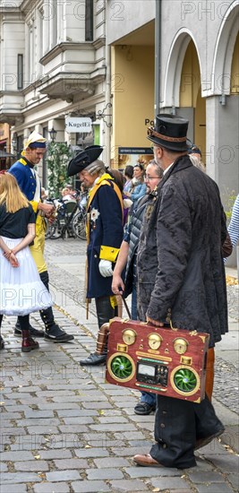 Artist with historical costume at a festival in the Nikolaiviertel quarter