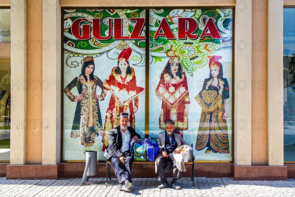 Men in front of traditional fashion shop