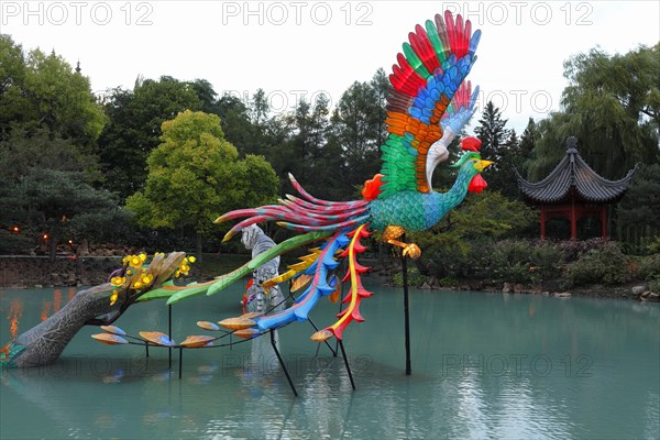 Illuminated figures at the Chinese Garden