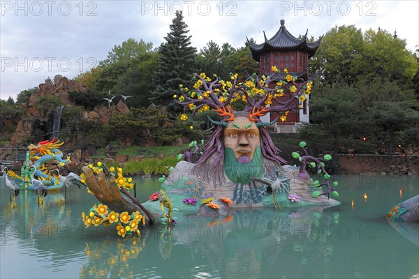 Illuminated figures at the Chinese Garden