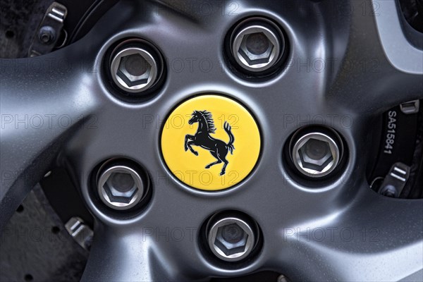 Forged rim with Ferrari logo horse