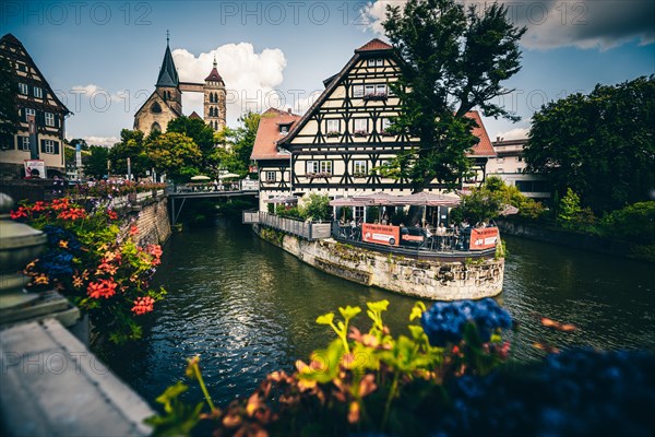 View over Wehrneckarkanal chanel to St. Dionys church