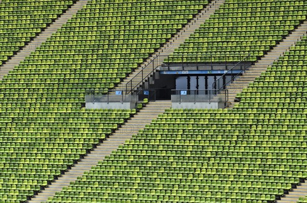 Green rows of seats in the Olympic Stadium