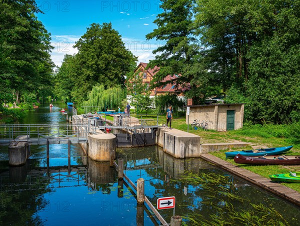 Recreational sportsman with canoe at the Dubkower lock in the Spreewald