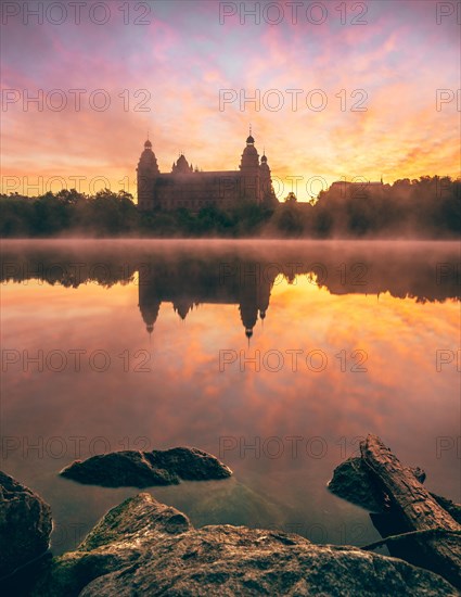 Johannisburg Castle reflected in the Main River