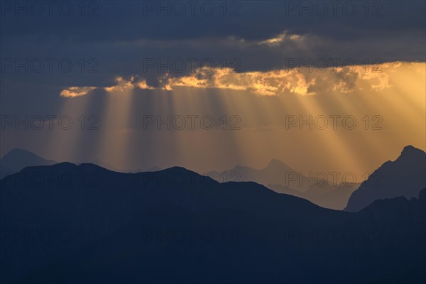 Sunrise with clouds over Allgaeu mountains