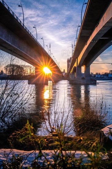 Under the Nibelungen Bridge in Worms at sunset on the Rhine