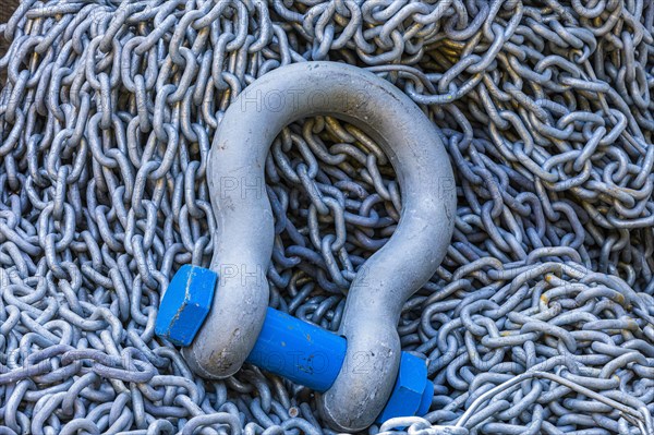 Steel eyelet with screw bolt and chain in Portofino harbour