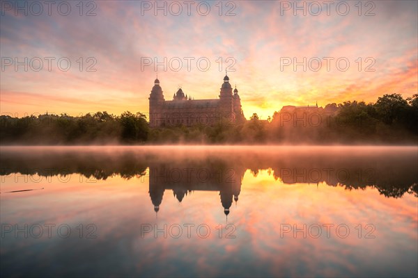 Johannisburg Castle reflected in the Main River