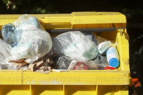 Yellow bin for plastic waste