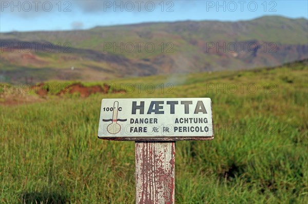 Sign warning of hot springs and heat in a geothermal field