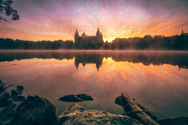 Johannisburg Castle reflected in the Main River